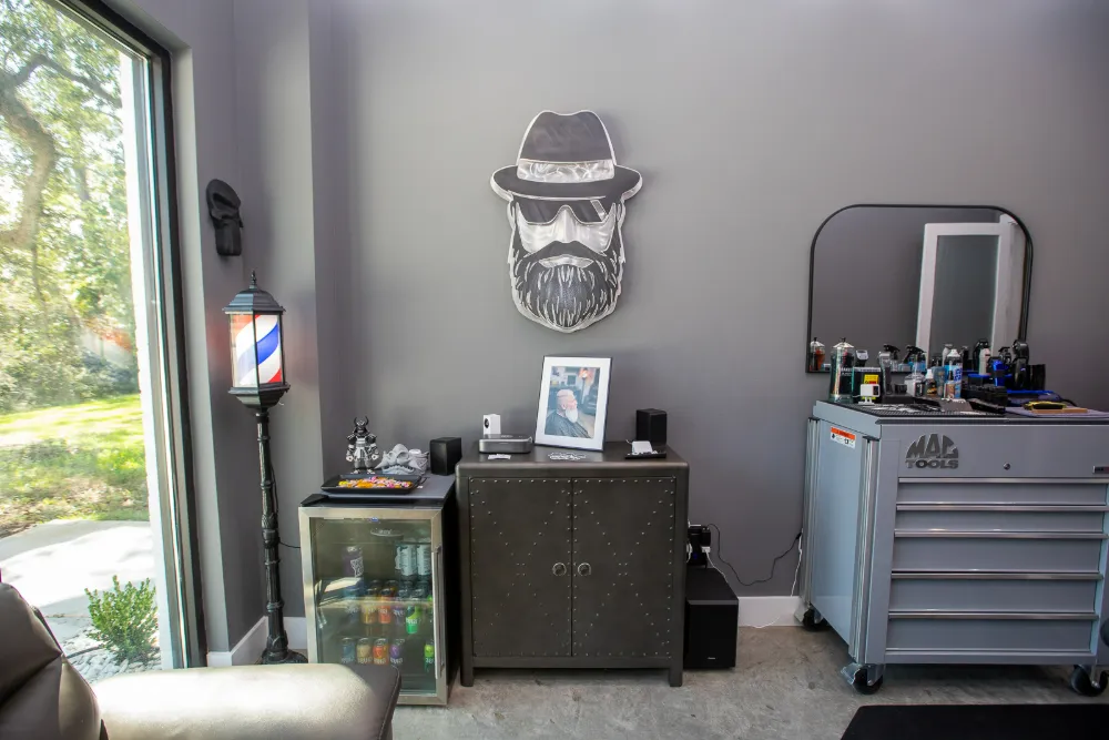 Barber suite with barber pole and tool chest at Belle Vie The Suites in Ponchatoula, LA