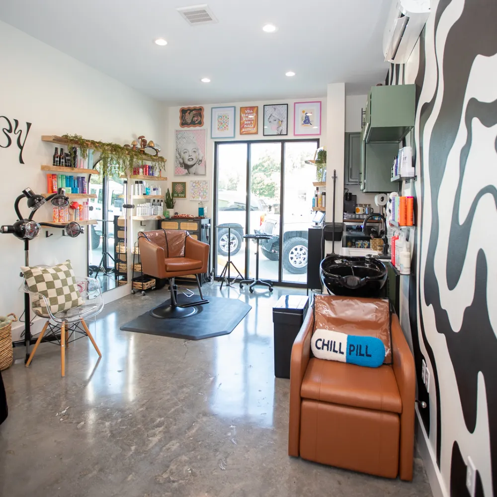 Private hair salon suite with styling chair and shampoo station at Belle Vie The Suites in Ponchatoula, LA